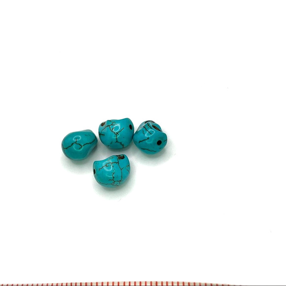 Turquoise hand carved skull beads - Picture 3 of 7